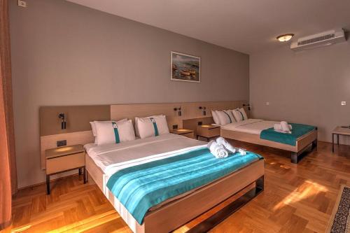 Imagen de la habitación del Hotel Magnolia Place. Foto 17