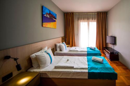 Imagen de la habitación del Hotel Magnolia Place. Foto 18