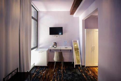 Imagen de la habitación del Hotel Magnolia, Tbilisi. Foto 16