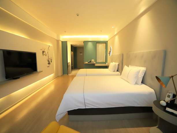 Imagen de la habitación del Hotel Magnotel Cangzhou International Hardware City. Foto 10