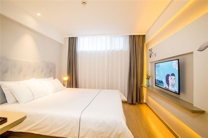 Imagen de la habitación del Hotel Magnotel Harbin Songbei Wanda Tourism Zone. Foto 10