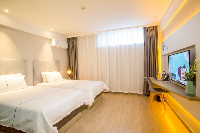 Imagen de la habitación del Hotel Magnotel Harbin Songbei Wanda Tourism Zone. Foto 12