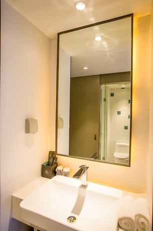 Imagen de la habitación del Hotel Magnotel Harbin Songbei Wanda Tourism Zone. Foto 15