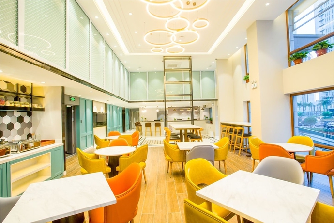 Imagen del bar/restaurante del Hotel Magnotel Harbin Songbei Wanda Tourism Zone. Foto 3
