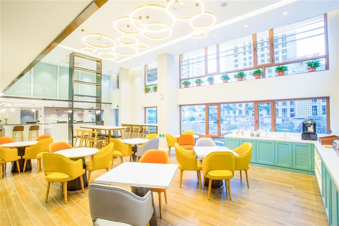 Imagen del bar/restaurante del Hotel Magnotel Harbin Songbei Wanda Tourism Zone. Foto 4
