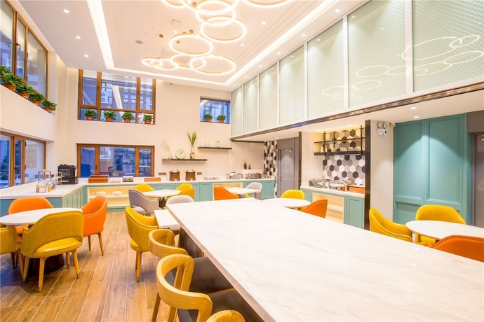 Imagen del bar/restaurante del Hotel Magnotel Harbin Songbei Wanda Tourism Zone. Foto 5