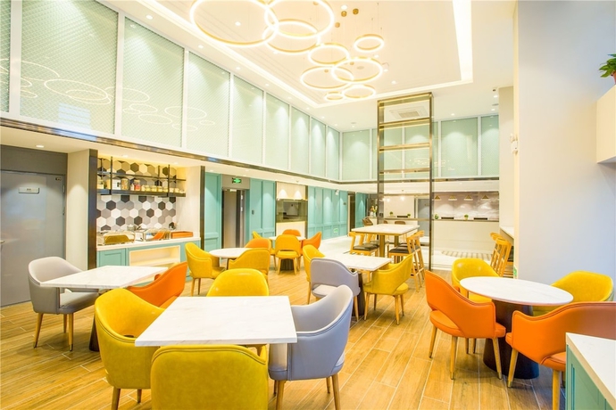 Imagen del bar/restaurante del Hotel Magnotel Harbin Songbei Wanda Tourism Zone. Foto 7