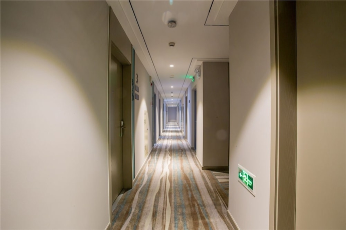 Imagen de los interiores del Hotel Magnotel Harbin Songbei Wanda Tourism Zone. Foto 19