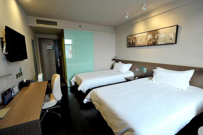 Imagen de la habitación del Hotel Magnotel Hotel Beijing West Railway Station. Foto 7