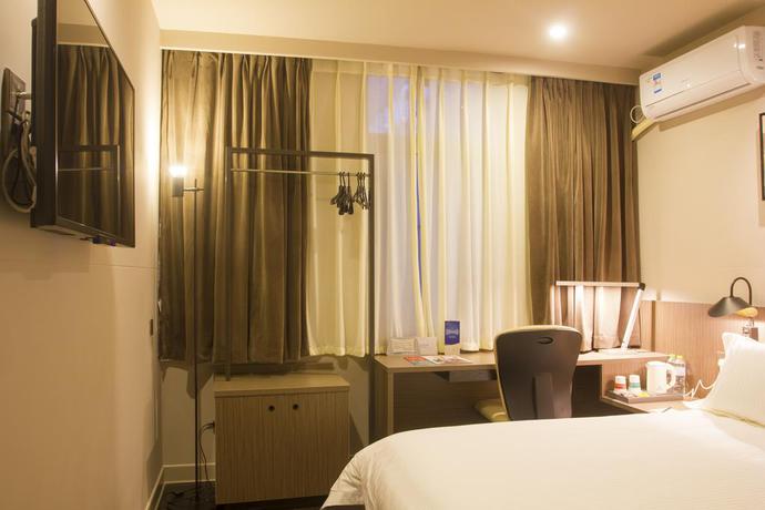 Imagen de la habitación del Hotel Magnotel Hotel Beijing West Railway Station. Foto 12