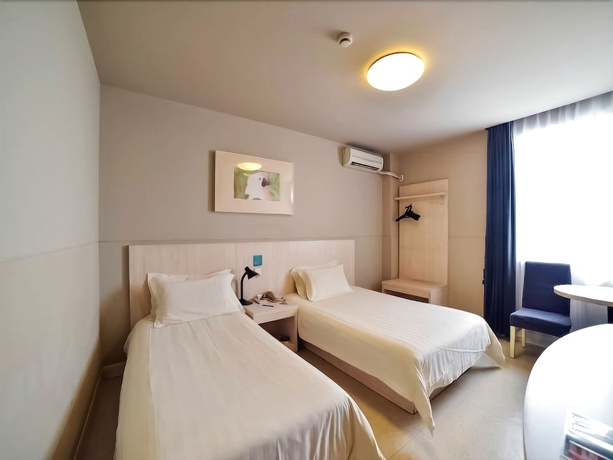 Imagen de la habitación del Hotel Magnotel Hotel Xiamen University Shimao Twin Tower. Foto 6