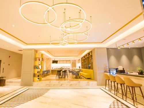 Imagen general del Hotel Magnotel Huizhou South Railway Station. Foto 5