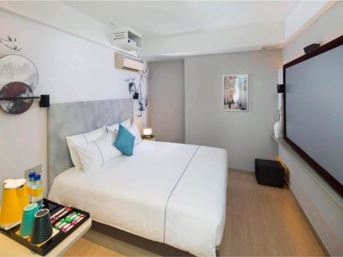 Imagen de la habitación del Hotel Magnotel Nanjing University of Aeronautics and Astronautics Shengtai West Road. Foto 12