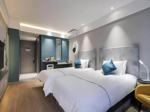 Imagen de la habitación del Hotel Magnotel Nanjing University of Aeronautics and Astronautics Shengtai West Road. Foto 16