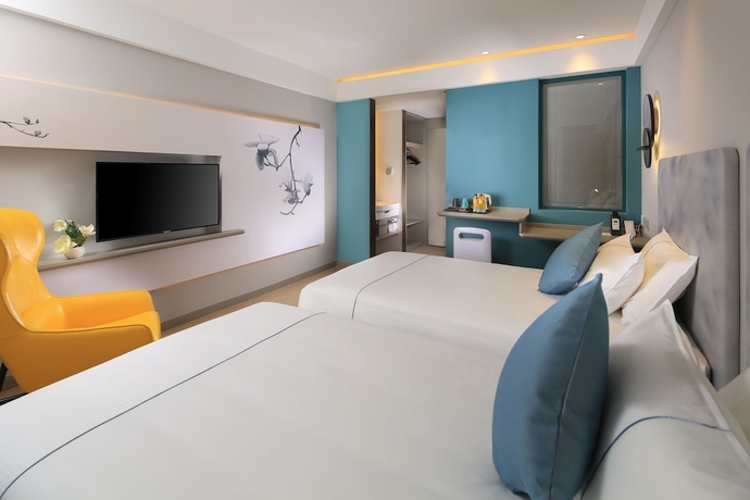 Imagen de la habitación del Hotel Magnotel Of Shanghai Jinjiang Park. Foto 12