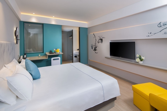 Imagen de la habitación del Hotel Magnotel Of Shanghai Jinjiang Park. Foto 13