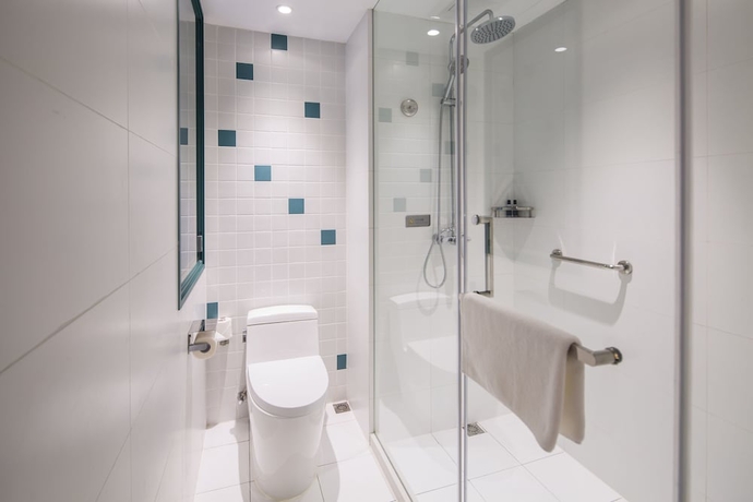 Imagen de la habitación del Hotel Magnotel Of Shanghai Jinjiang Park. Foto 15