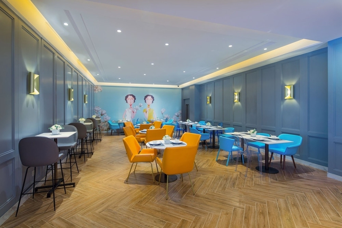 Imagen del bar/restaurante del Hotel Magnotel Of Shanghai Jinjiang Park. Foto 6