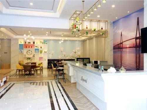 Imagen general del Hotel Magnotel Qionghai Wanquanhe Aihua Road. Foto 4