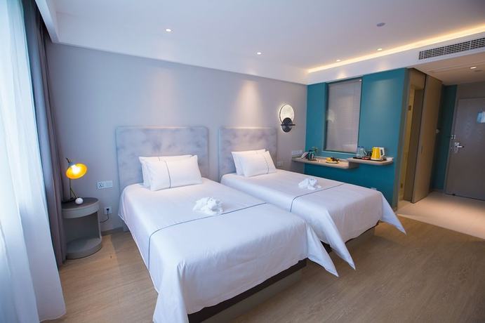 Imagen de la habitación del Hotel Magnotel Wenzhou Wu-ma street hotel. Foto 7