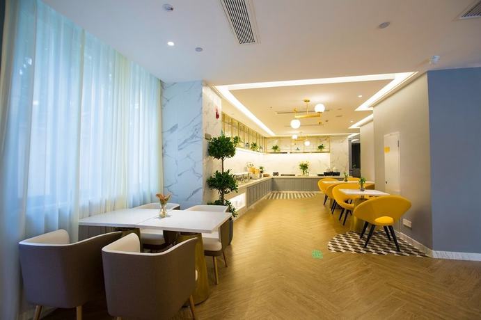 Imagen del bar/restaurante del Hotel Magnotel Wenzhou Wu-ma street hotel. Foto 3