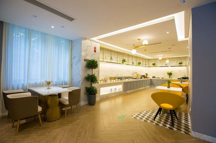 Imagen del bar/restaurante del Hotel Magnotel Wenzhou Wu-ma street hotel. Foto 4
