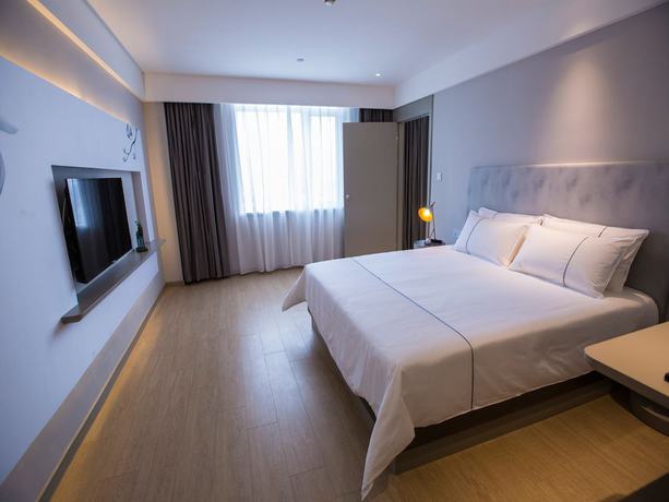 Imagen de la habitación del Hotel Magnotel Wenzhou Wu-ma street hotel. Foto 11