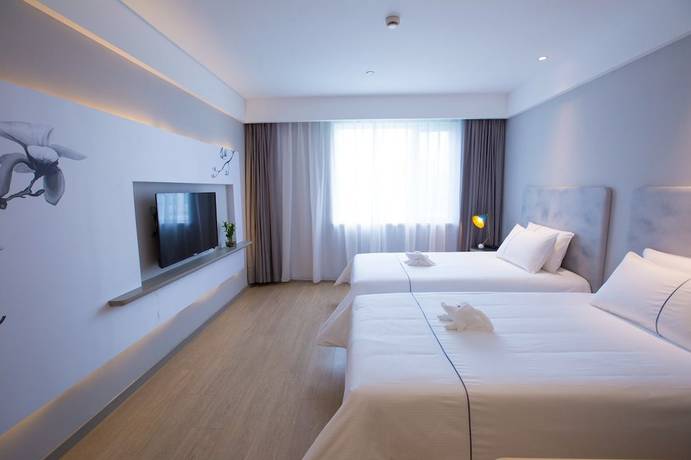 Imagen de la habitación del Hotel Magnotel Wenzhou Wu-ma street hotel. Foto 14