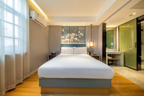 Imagen de la habitación del Hotel Magnotel Xi\'an Aerospace City Subway Station. Foto 13