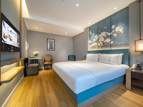 Imagen de la habitación del Hotel Magnotel Xi\'an Aerospace City Subway Station. Foto 16