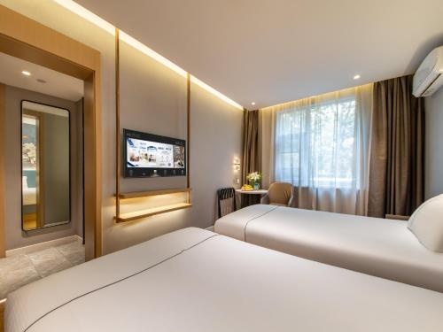 Imagen de la habitación del Hotel Magnotel Xi\'an Aerospace City Subway Station. Foto 19