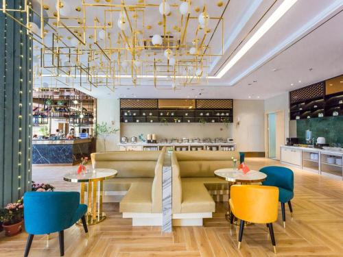 Imagen general del Hotel Magnotel YangZhou China Grand Canal Museum Wanda Plaza. Foto 5