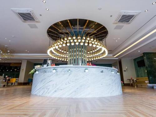 Imagen general del Hotel Magnotel YangZhou China Grand Canal Museum Wanda Plaza. Foto 6