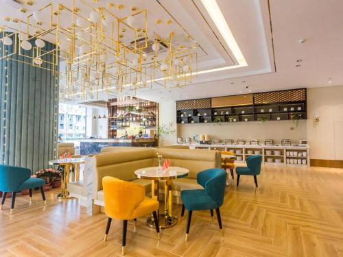 Imagen general del Hotel Magnotel YangZhou China Grand Canal Museum Wanda Plaza. Foto 7