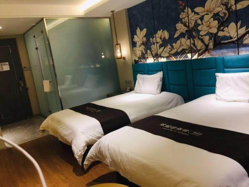 Imagen general del Hotel Magnotel YangZhou China Grand Canal Museum Wanda Plaza. Foto 8