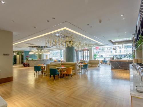 Imagen general del Hotel Magnotel YangZhou China Grand Canal Museum Wanda Plaza. Foto 9