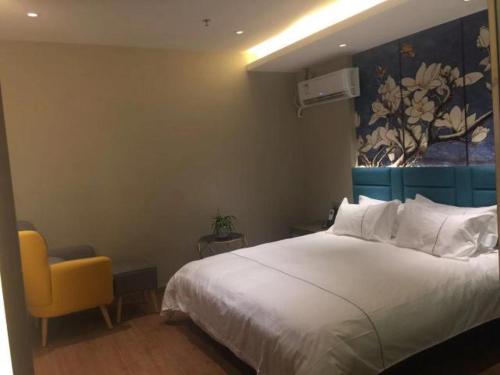 Imagen de la habitación del Hotel Magnotel YangZhou China Grand Canal Museum Wanda Plaza. Foto 16