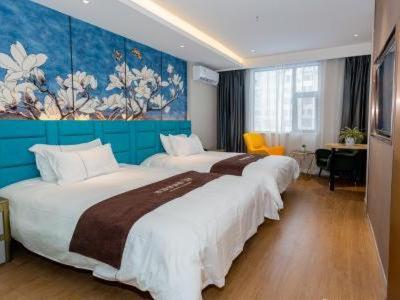 Imagen de la habitación del Hotel Magnotel YangZhou China Grand Canal Museum Wanda Plaza. Foto 17