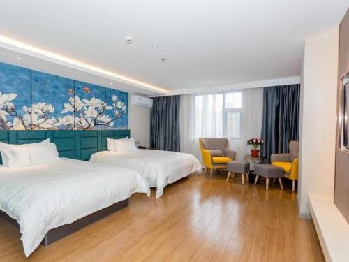 Imagen de la habitación del Hotel Magnotel YangZhou China Grand Canal Museum Wanda Plaza. Foto 20