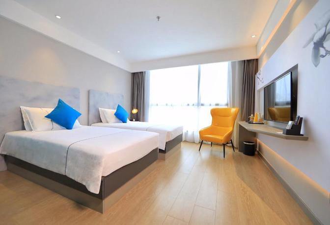 Imagen de la habitación del Hotel Magnotel Yangzhou Geyuan Dongguan Street. Foto 5