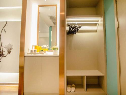 Imagen general del Hotel Magnotel Yangzhou Jinghua Wangyue Road. Foto 4