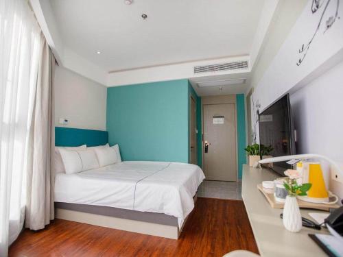 Imagen general del Hotel Magnotel Yangzhou Jinghua Wangyue Road. Foto 10