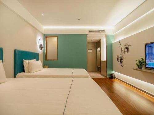 Imagen general del Hotel Magnotel Yangzhou Jinghua Wangyue Road. Foto 11