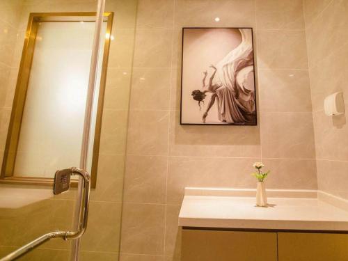 Imagen de la habitación del Hotel Magnotel Yangzhou Jinghua Wangyue Road. Foto 19