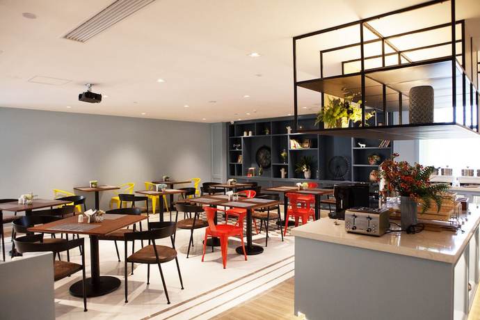 Imagen del bar/restaurante del Hotel Magnotel of Commercial Street Yulong Road Binhai Yancheng. Foto 4