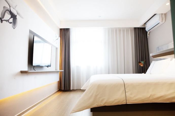 Imagen de la habitación del Hotel Magnotel of Commercial Street Yulong Road Binhai Yancheng. Foto 6