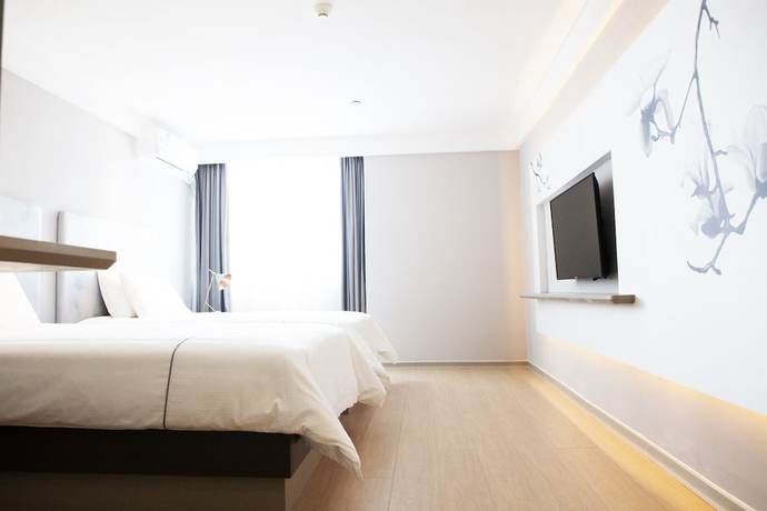 Imagen de la habitación del Hotel Magnotel of Commercial Street Yulong Road Binhai Yancheng. Foto 7