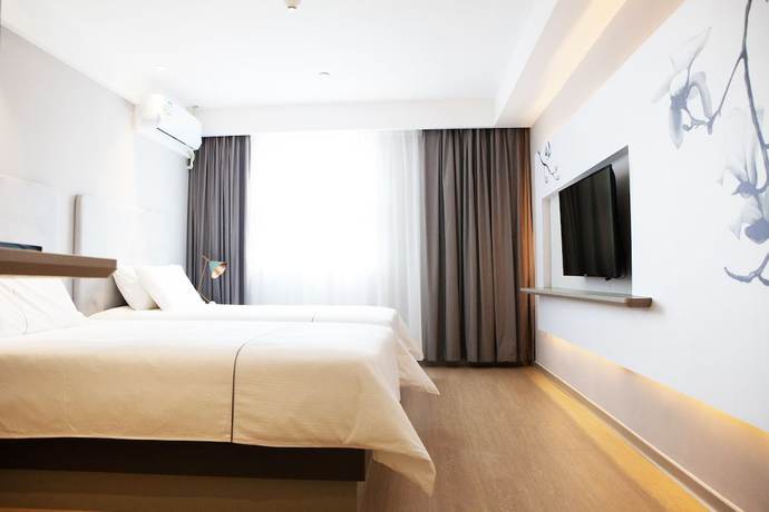 Imagen de la habitación del Hotel Magnotel of Commercial Street Yulong Road Binhai Yancheng. Foto 8