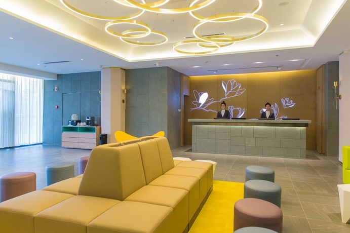 Imagen de los interiores del Hotel Magnotel the city government huludao. Foto 10