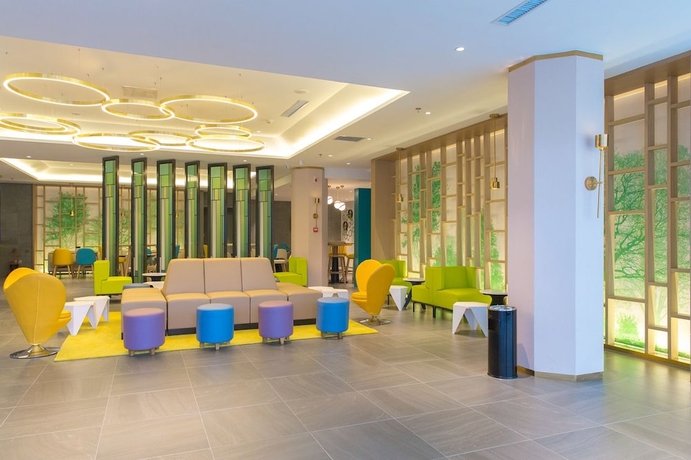 Imagen de los interiores del Hotel Magnotel the city government huludao. Foto 11